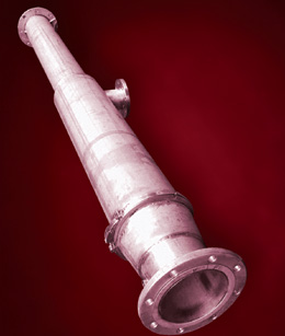 The FlowEnhancer, a new feature for pneumatic conveying systems For reduction of the velocity and increase of the flow rate