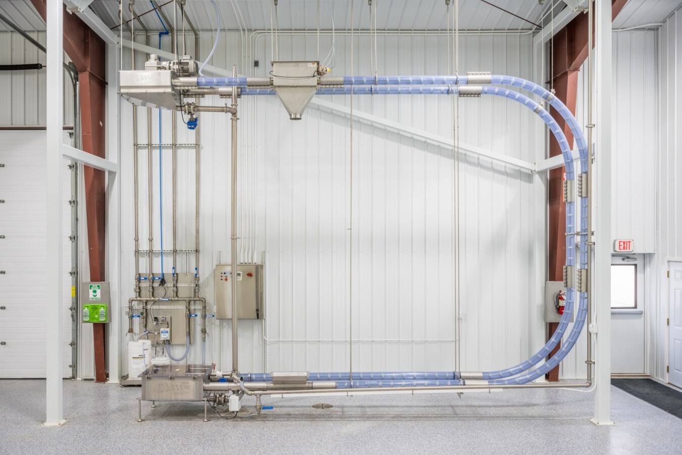 Akona launches UK production of Cablevey systems  Material processing and handling solutions specialist, Akona Process Solutions, is now building Cablevey conveying systems in the UK, delivering faster lead times, lower costs and a smarter solution for European manufacturers.