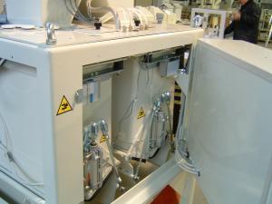 Electronic weigher with twin measuring hopper New concept eliminates infeed hopper