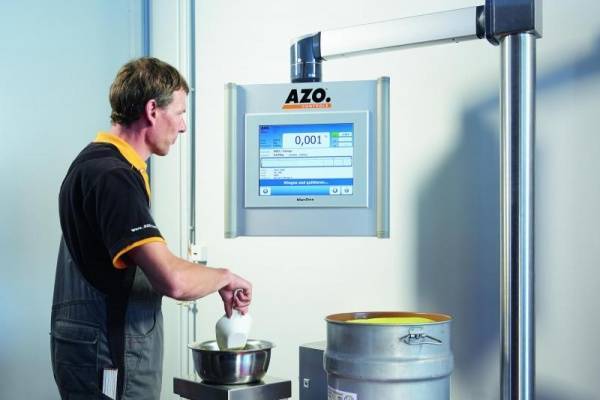 ManDos: an operator-guided manual weighing system 